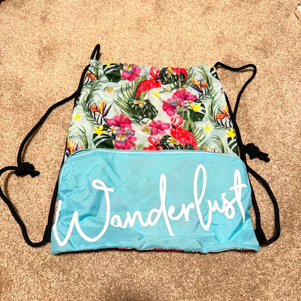 “Wanderlust” Drawstring Backpack With Front Pouch - image 1